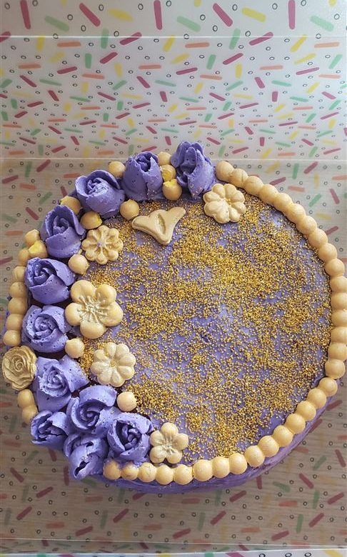 Purple and gold buttercream cake with roses